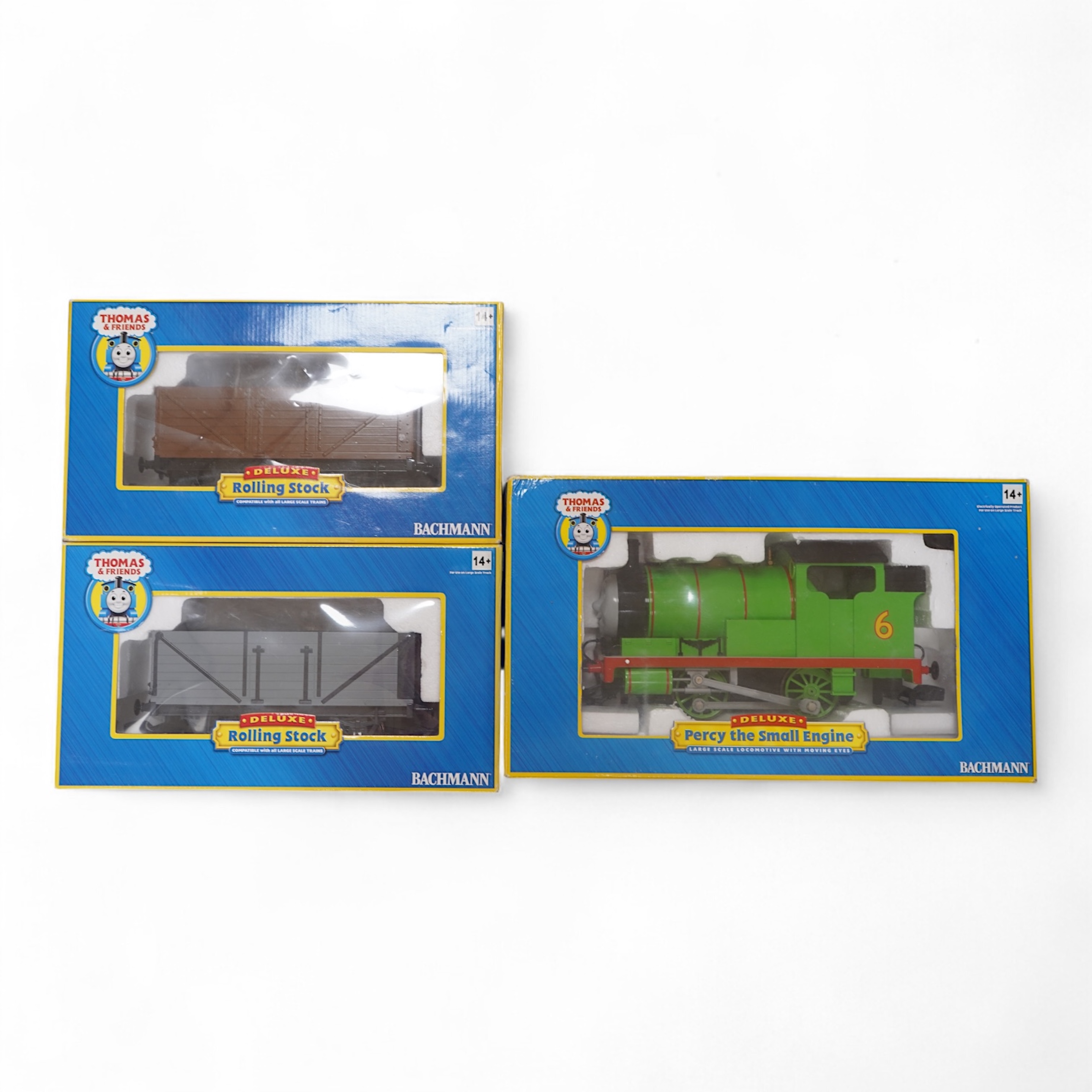 Three boxed Bachmann G gauge (45mm gauge) Thomas the Tank Engine items; Percy the Small Engine (91402), a Cargo Car (98006) and a Troublesome Truck (98001). Condition - good.
